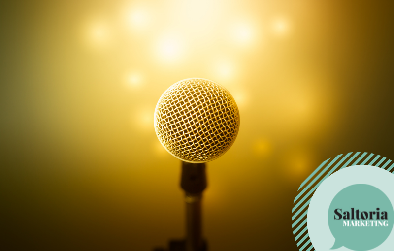 saltoria Microphone against goldish background to represent efficient tone of voice