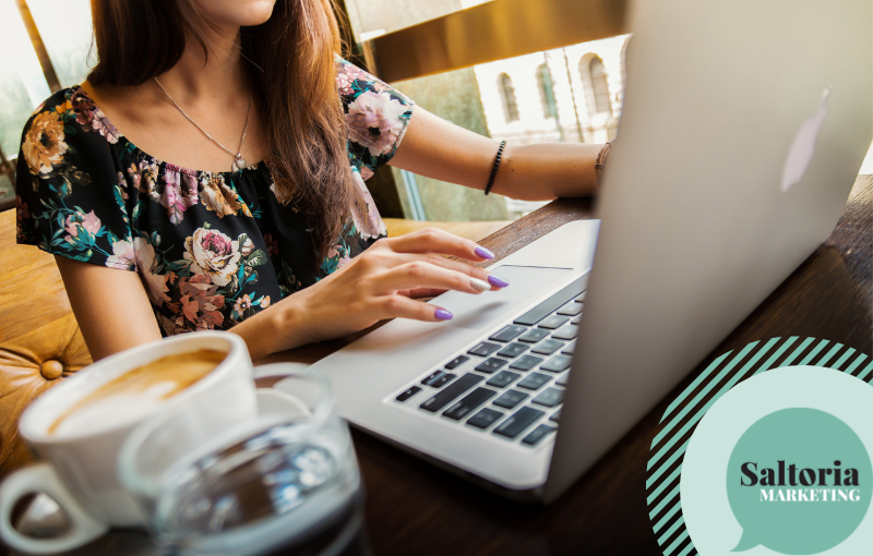 saltoria Woman on laptop with a cup of tea to showcase someone working on their personal branding or exploring personal branding examples