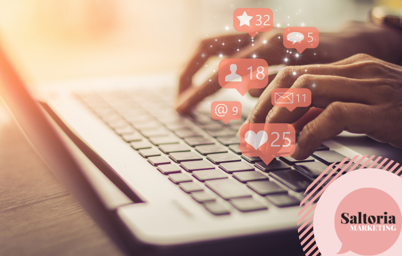 saltoria Person typing on laptop with social icons suggesting likes and engagement. Image is symbolic of multiple marketing techniques on offer.